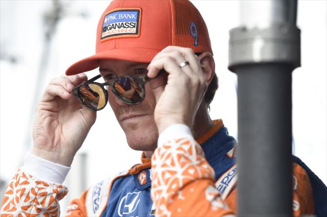 Scott Dixon slides on his sunglasses along pit lane prior to his qualification attempt for the ABC Supply 500 at Pocono Raceway -- Photo by: Chris Owens