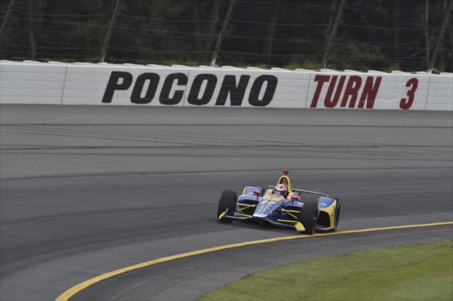 Alexander Rossi hits the apex of Turn 3 during practice for the ABC Supply 500 at Pocono Raceway -- Photo by: Chris Owens