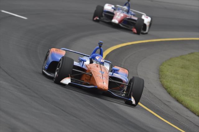 Scott Dixon and Tony Kanaan race through Turn 3 during practice for the ABC Supply 500 at Pocono Raceway -- Photo by: Chris Owens