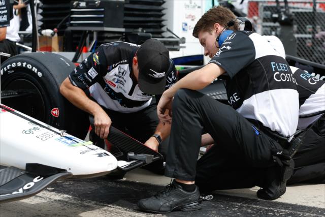 Rahal Letterman Lanigan Racing crewman adjust the front wing of Graham Rahal on pit lane prior to his qualification attempt for the ABC Supply 500 at Pocono Raceway -- Photo by: Joe Skibinski