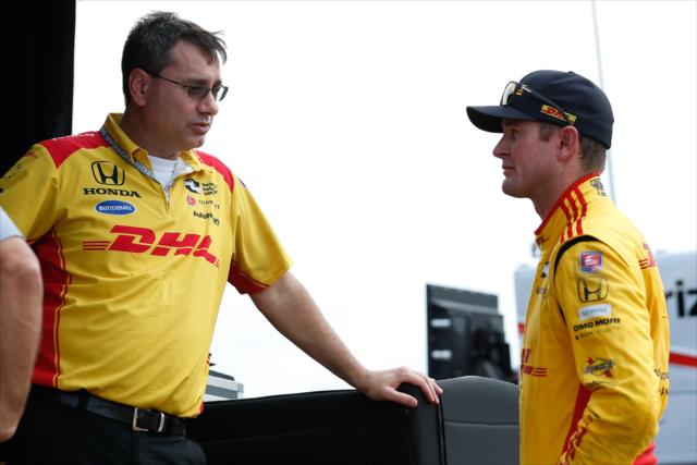 Ryan Hunter-Reay chats with his chief engineer, Ray Gosselin, on pit lane prior to practice for the ABC Supply 500 at Pocono Raceway -- Photo by: Joe Skibinski