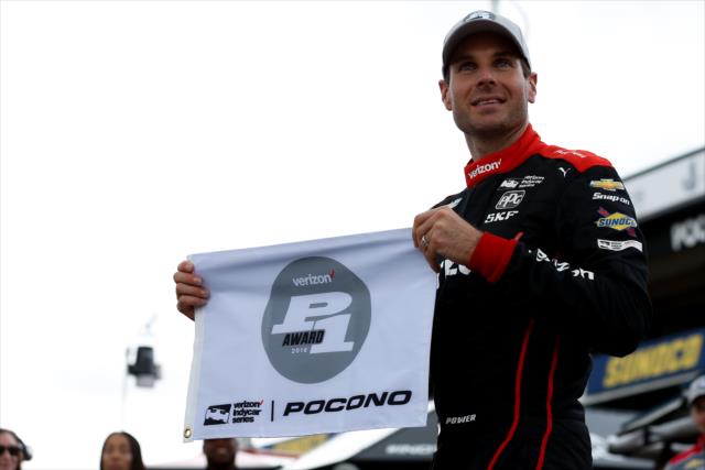 Will Power with the Verizon P1 Award flag on pit lane after winning the pole position for the ABC Supply 500 at Pocono Raceway -- Photo by: Joe Skibinski