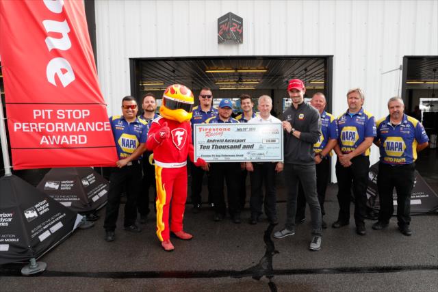 Alexander Rossi accepts the Firestone Pit Stop Performance Award on behalf of Andretti Autosport for their performance at Mid-Ohio -- Photo by: Joe Skibinski