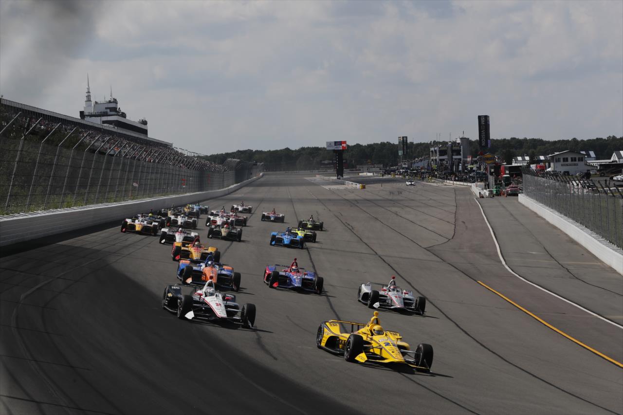 Simon Pagenaud leads the field into Turn 1 -- Photo by: Chris Owens