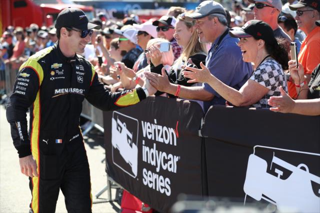 Simon Pagenaud greets the fans gathered in front of the stage during pre-race festivities for the Grand Prix of Portland at Portland International Raceway -- Photo by: Chris Jones
