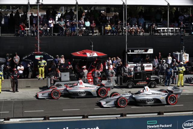 Teammates Will Power and Josef Newgarden sit on the grid prior to the start of the the Grand Prix of Portland at Portland International Raceway -- Photo by: Chris Jones