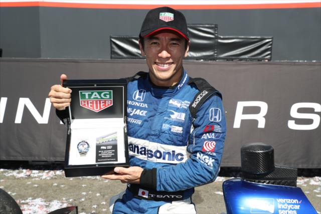 Takuma Sato with his TAG Heuer Winner's Watch in Victory Circle after winning the Grand Prix of Portland at Portland International Raceway -- Photo by: Chris Jones