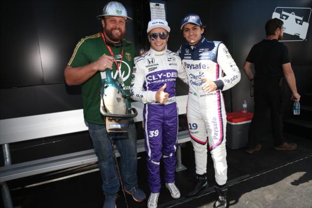 Timber Joey of the MLS Portland Timbers with Dale Coyne Racing teammates Santino Ferrucci and Pietro Fittipaldi backstage during pre-race festivities for the Grand Prix of Portland at Portland International Raceway -- Photo by: Chris Jones