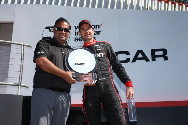 Will Power is presented the Verizon P1 Award for winning the pole position during pre-race festivities for the Grand Prix of Portland at Portland International Raceway -- Photo by: Chris Jones