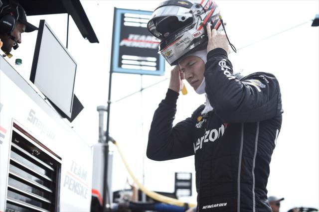 Josef Newgarden slides on his helmet on pit lane prior to the start of the Grand Prix of Portland at Portland International Raceway -- Photo by: Chris Owens