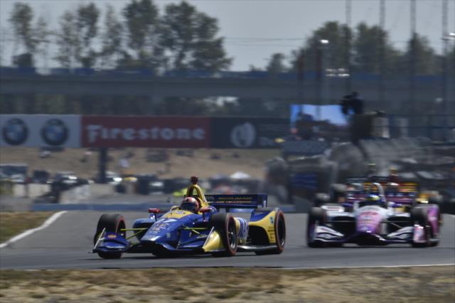 Alexander Rossi and Sebastien Bourdais set up for Turn 4 during the Grand Prix of Portland at Portland International Raceway -- Photo by: Chris Owens