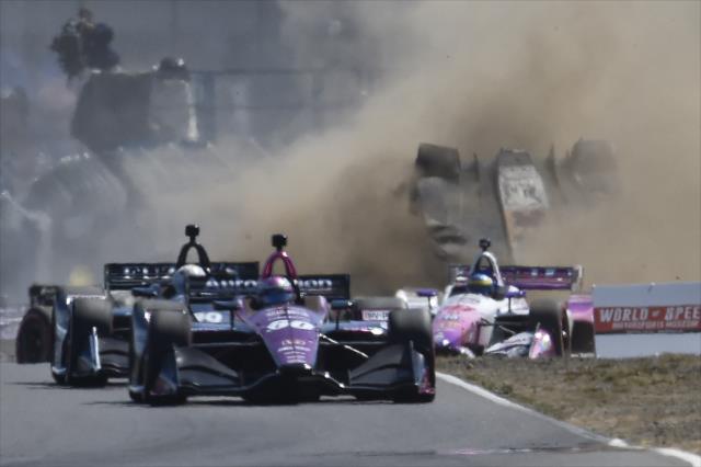 Marco Andretti flips exiting Turn 3 during the Grand Prix of Portland at Portland International Raceway -- Photo by: Chris Owens