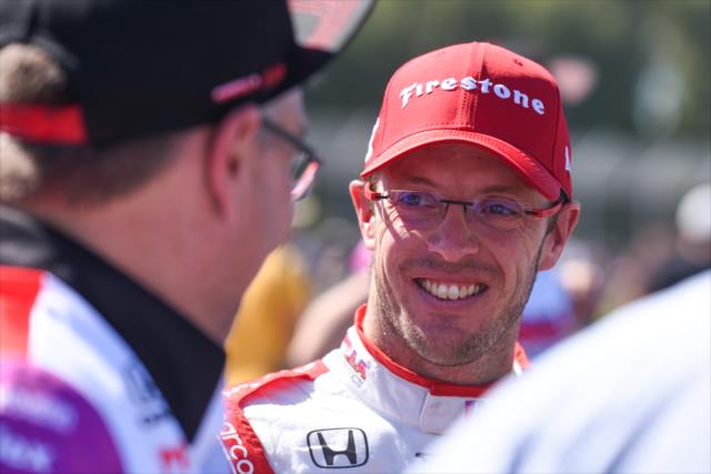 Sebastien Bourdais is congratulated by his team on pit lane after his 3rd Place finish in the Grand Prix of Portland at Portland International Raceway -- Photo by: James  Black