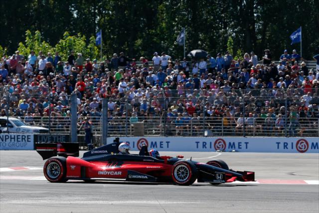 Arie Luyendyk Jr. pilots the two-seater through Turn 2 during the parade laps prior to the start of the Grand Prix of Portland at Portland International Raceway -- Photo by: Joe Skibinski