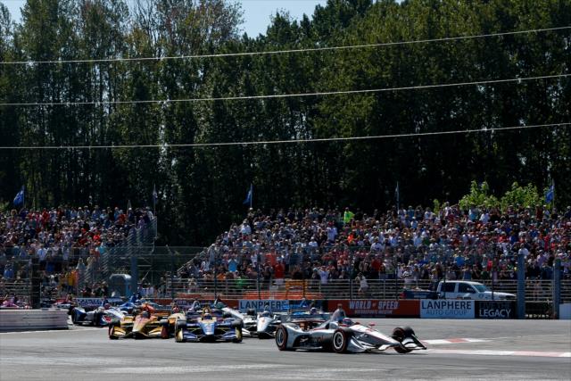 Will Power leads the field into the Festival Curves (Turns 1-2-3) during the start of the Grand Prix of Portland at Portland International Raceway -- Photo by: Joe Skibinski