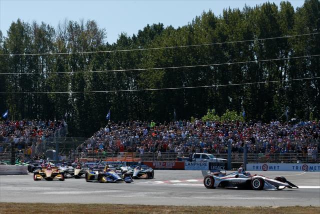 Will Power leads the field into the Festival Curves (Turns 1-2-3) during the start of the Grand Prix of Portland at Portland International Raceway -- Photo by: Joe Skibinski
