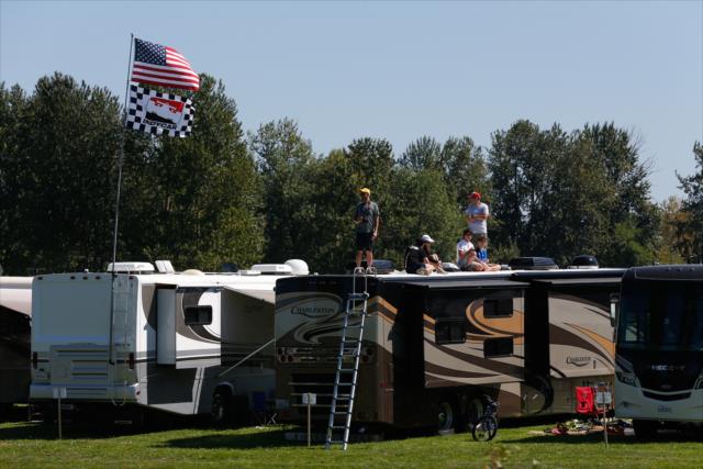 Fans watch from atop their recreational vehicles outside Turn 3 during the Grand Prix of Portland at Portland International Raceway -- Photo by: Joe Skibinski