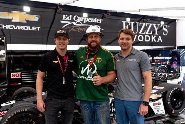 Timber Joey of the Portland Timbers meets Spencer Pigot and Jordan King in the Ed Carpenter Racing paddock at Portland International Raceway -- Photo by: Stephen King