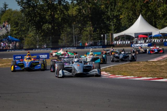 Josef Newgarden leads the a train of cars into Turn 6 during the Grand Prix of Portland at Portland International Raceway -- Photo by: Stephen King