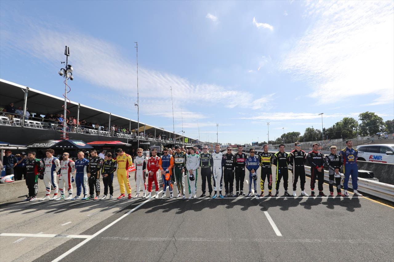 NTT IndyCar Series drivers holding a moment of silence for Formula 2 driver Anthoine Hubert -- Photo by: Chris Owens