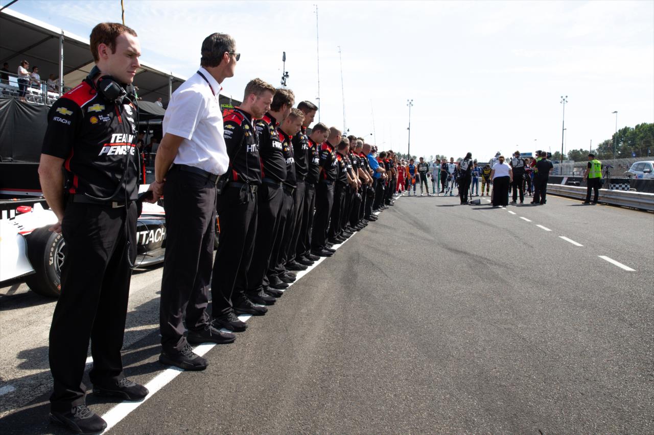 Teams holding a moment of silence for Formula 2 driver Anthoine Hubert -- Photo by: Stephen King