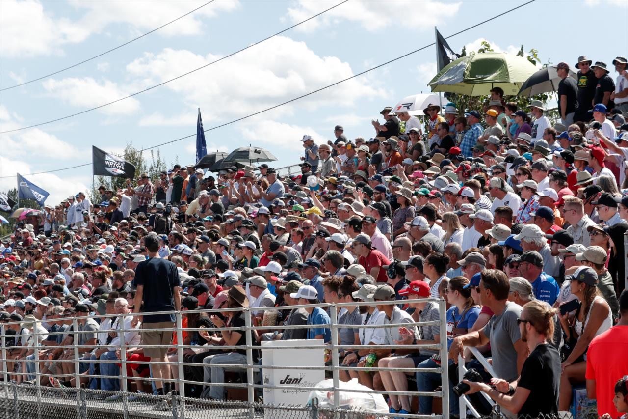 Fans pack a grandstand at the Grand Prix of Portland -- Photo by: Joe Skibinski