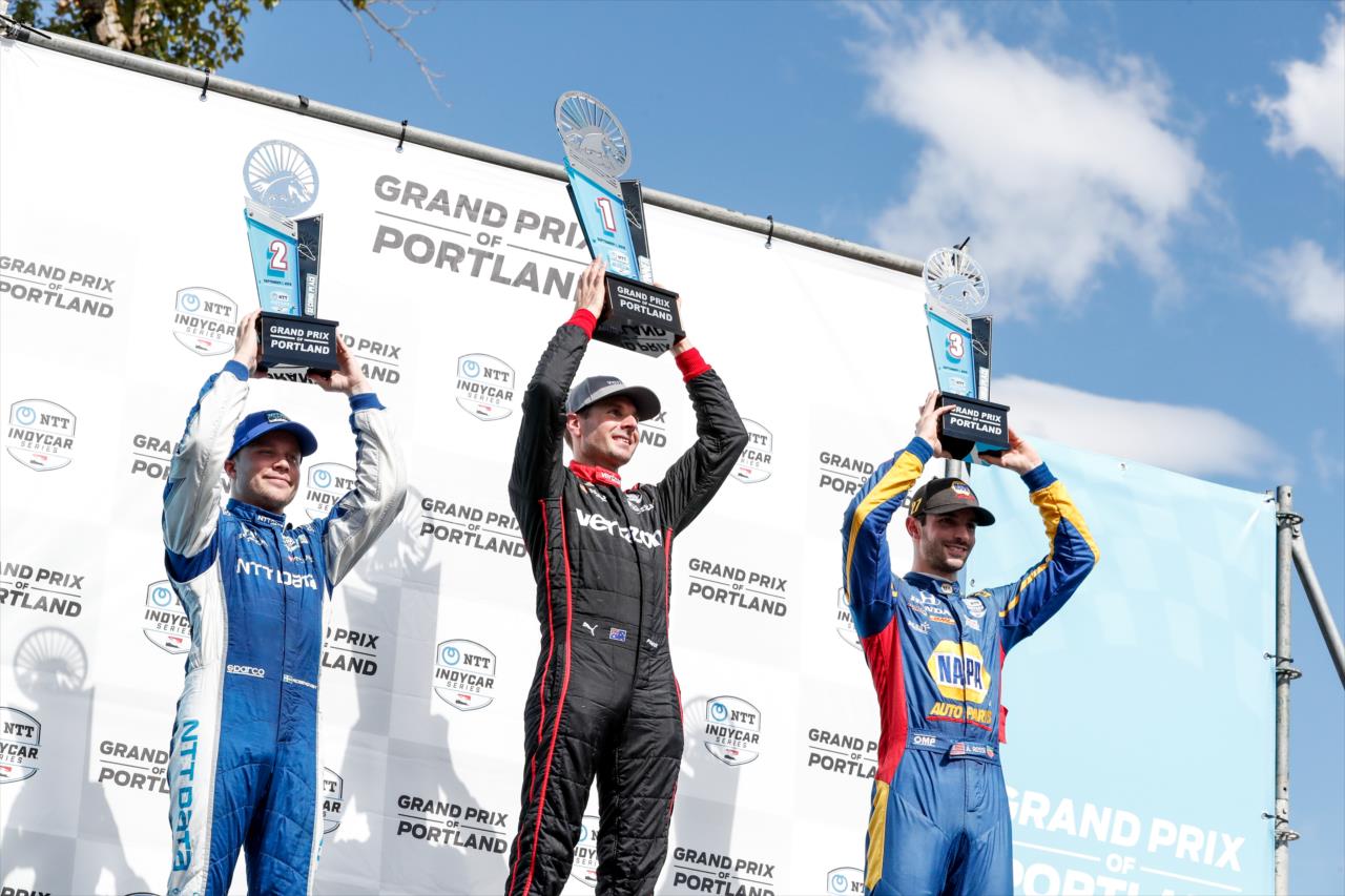 Felix Rosenqvist, Will Power and Alexander Rossi on the Grand Prix of Portland podium -- Photo by: Joe Skibinski
