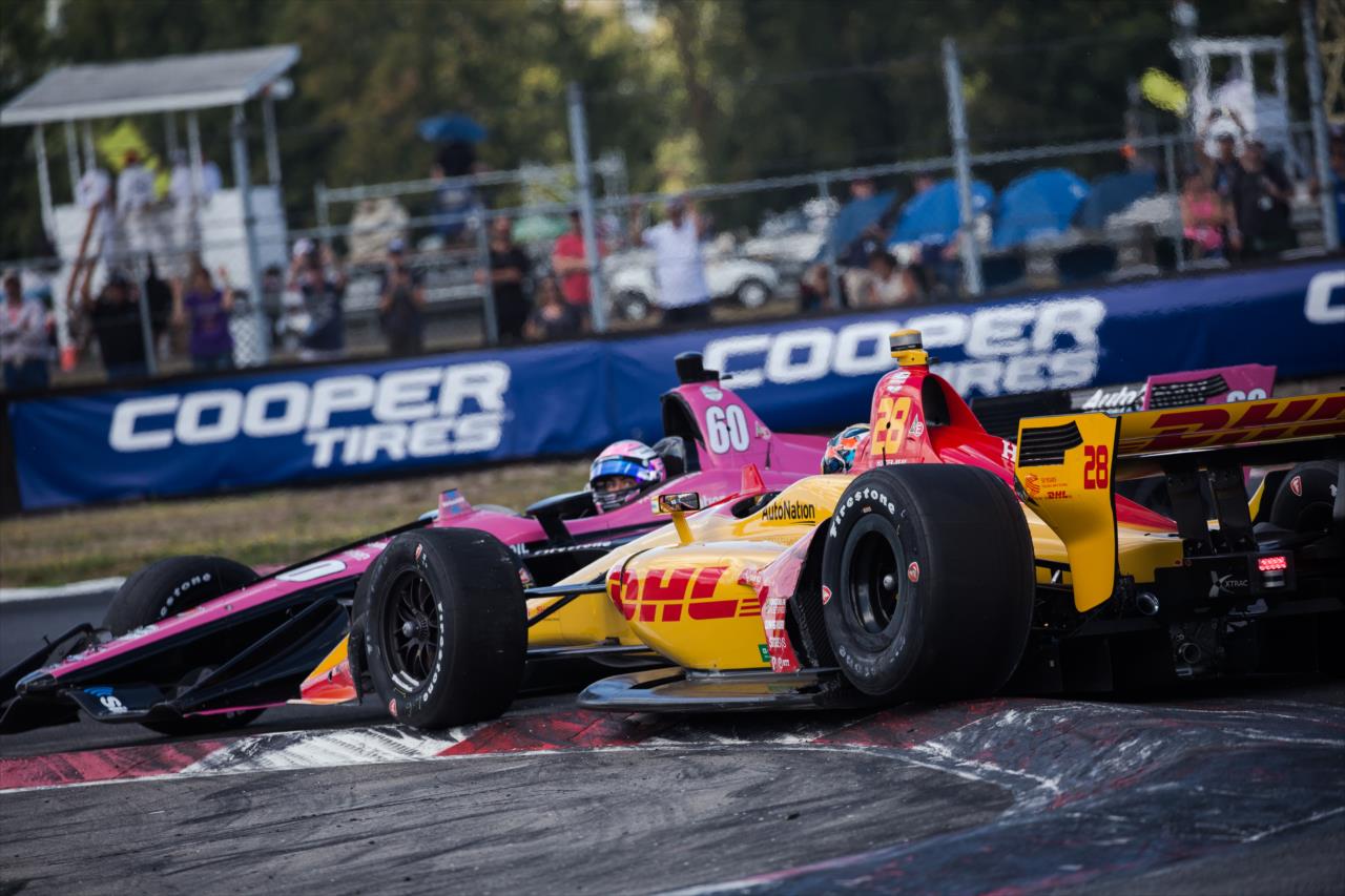 Ryan Hunter-Reay makes contact with Jack Harvey -- Photo by: Stephen King