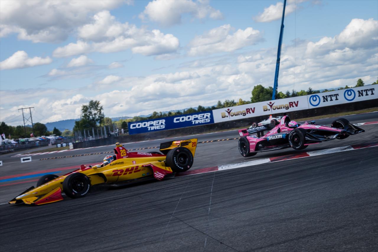 Ryan Hunter-Reay makes contact with Jack Harvey -- Photo by: Stephen King