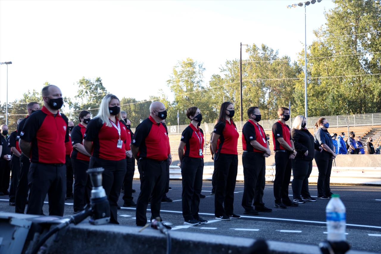 Members of Firestone during a moment of silence on the 20th anniversary of September 11, 2001 - Grand Prix of Portland -- Photo by: Joe Skibinski