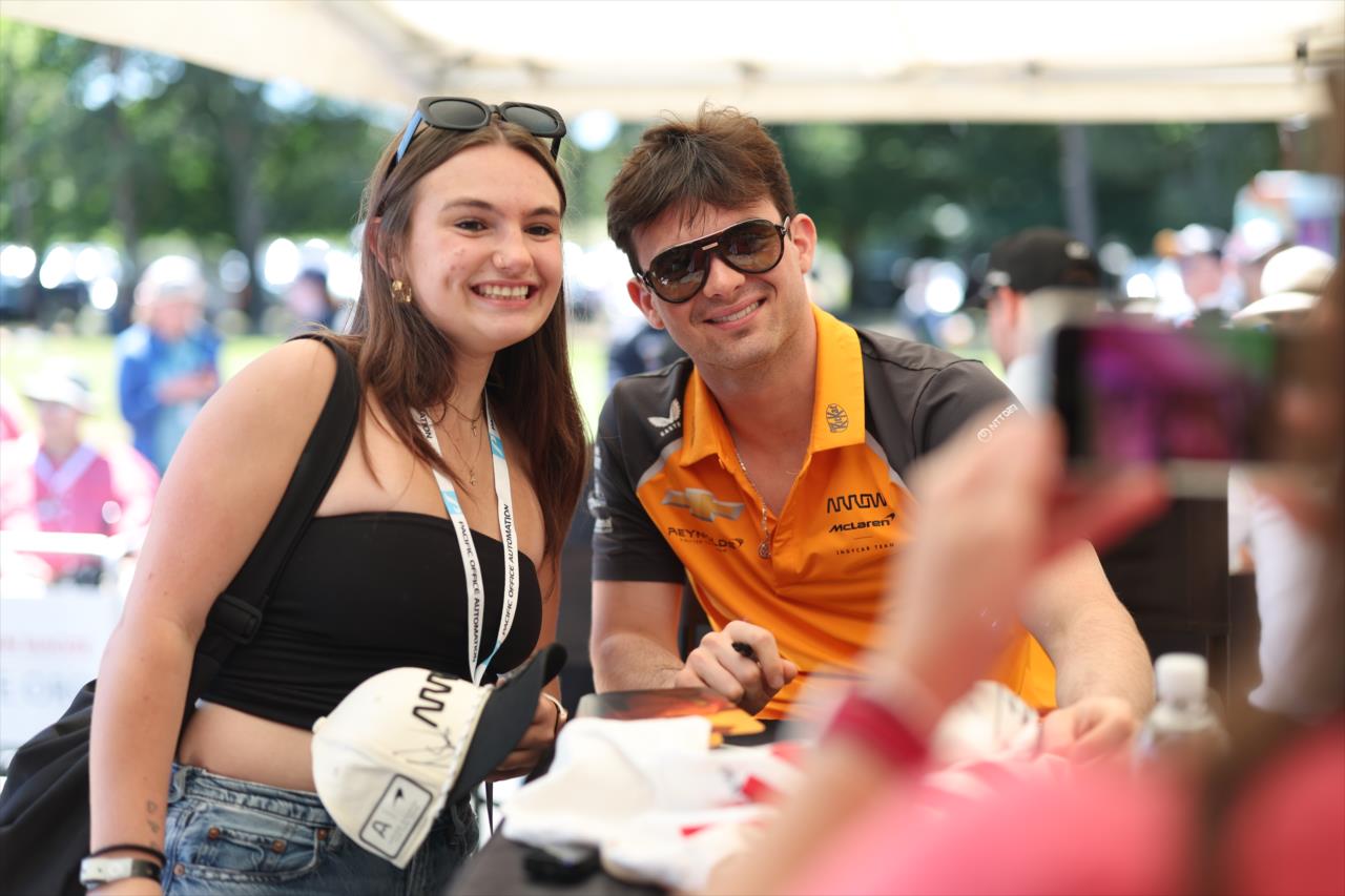 Pato O'Ward with a fan - BITNILE.com Grand Prix of Portland - By: Joe Skibinski -- Photo by: Joe Skibinski