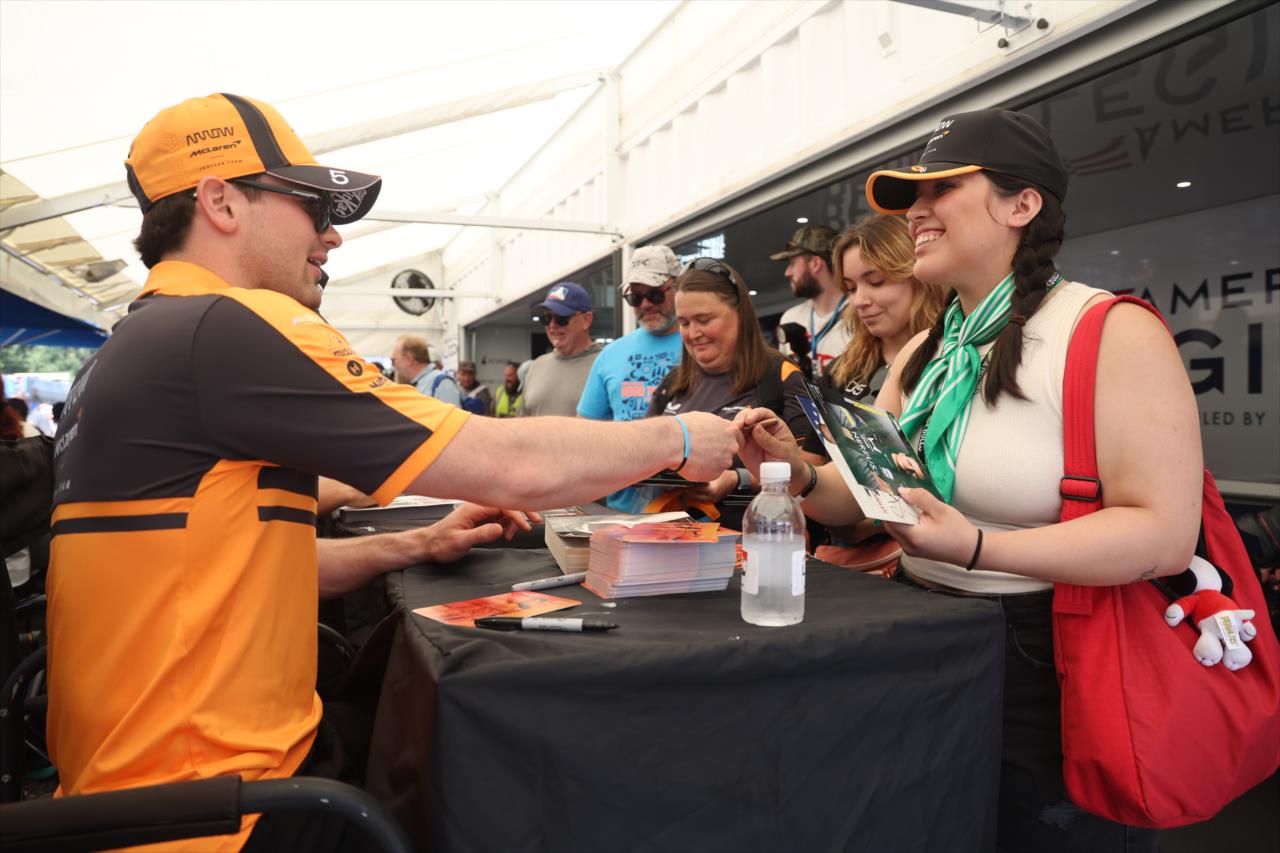 Pato O'Ward with a fan - OnlyBulls Grand Prix of Portland - By: Joe Skibinski -- Photo by: Joe Skibinski