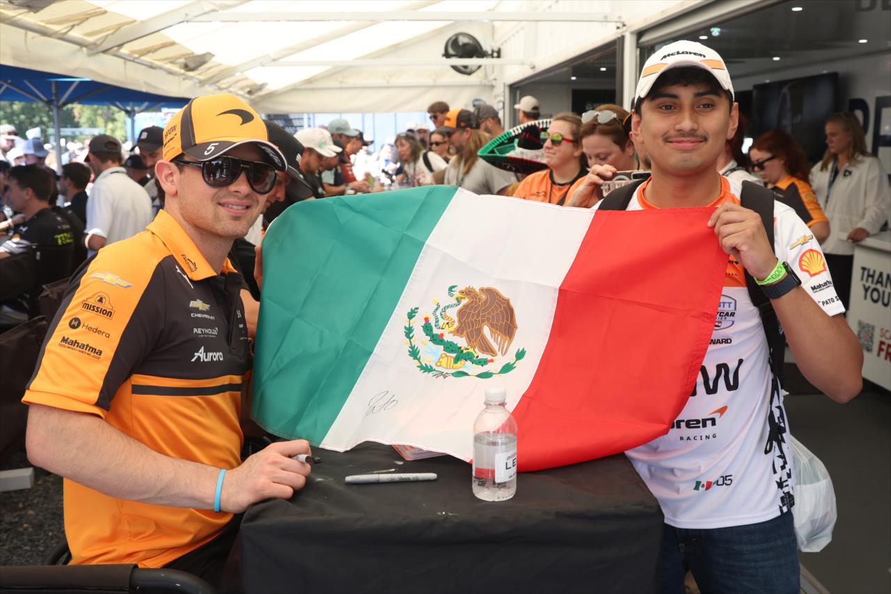Pato O'Ward with a fan - OnlyBulls Grand Prix of Portland - By: Joe Skibinski -- Photo by: Joe Skibinski