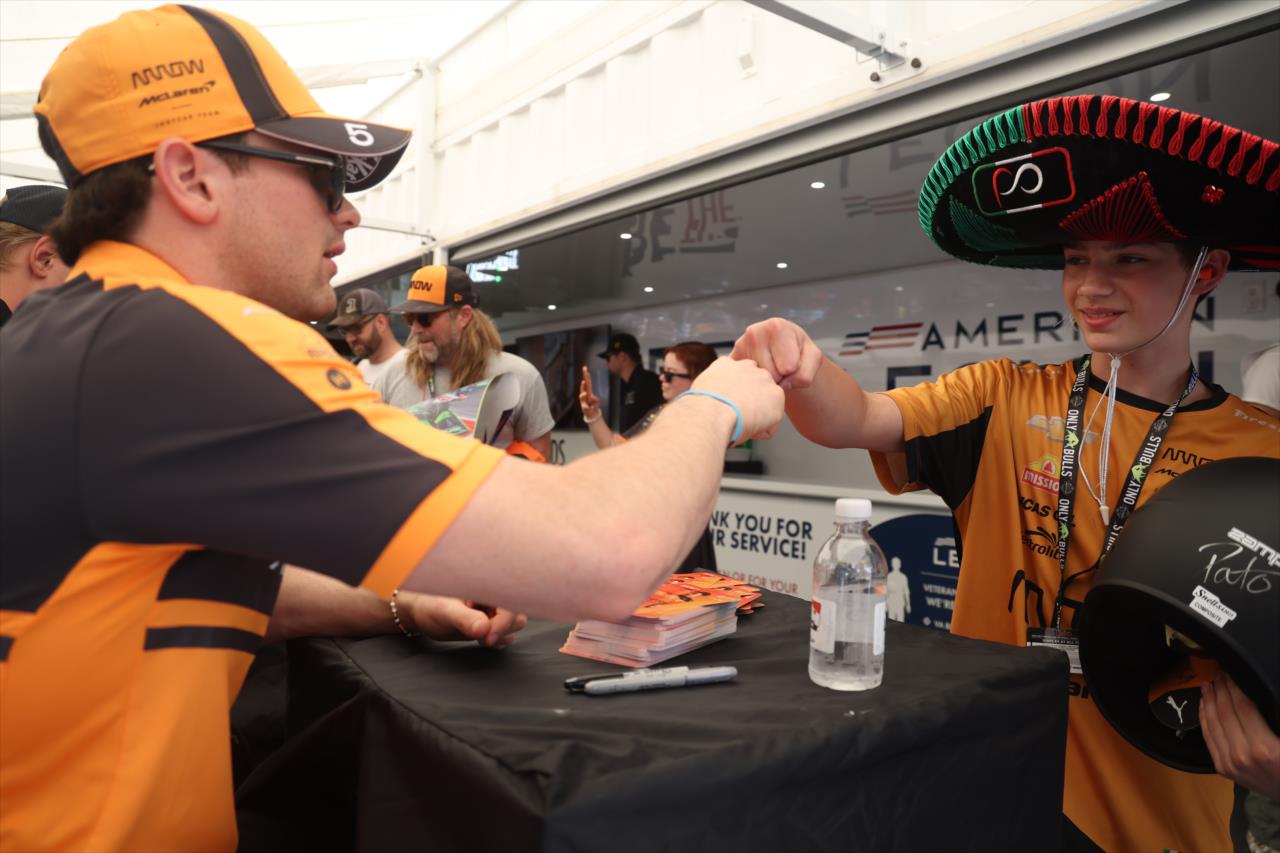 Pato O'Ward with a fan - OnlyBulls Grand Prix of Portland - By: Joe Skibinski -- Photo by: Joe Skibinski