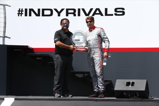 Will Power accepts the Verizon P1 Award for winning the pole position during pre-race festivities for the KOHLER Grand Prix at Road America -- Photo by: Chris Jones