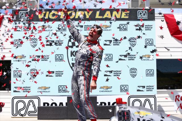 Will Power celebrates in Victory Lane following his win in the KOHLER Grand Prix of Road America -- Photo by: Chris Jones