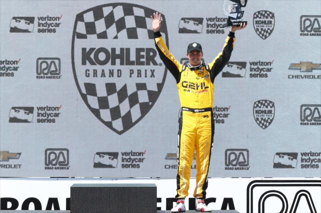 Graham Rahal celebrates on the podium following his 3rd Place finish in the KOHLER Grand Prix of Road America -- Photo by: Chris Jones