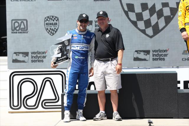 Tony Kanaan accepts his 2nd Place trophy in Victory Lane following the KOHLER Grand Prix of Road America -- Photo by: Chris Jones