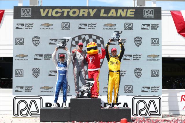 The podium of Will Power, Tony Kanaan, and Graham Rahal in Victory Lane following the KOHLER Grand Prix of Road America -- Photo by: Chris Jones