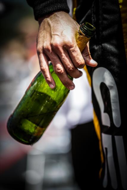 Empty champagne bottle of Graham Rahal following the Victory Lane celebration at Road America -- Photo by: Shawn Gritzmacher