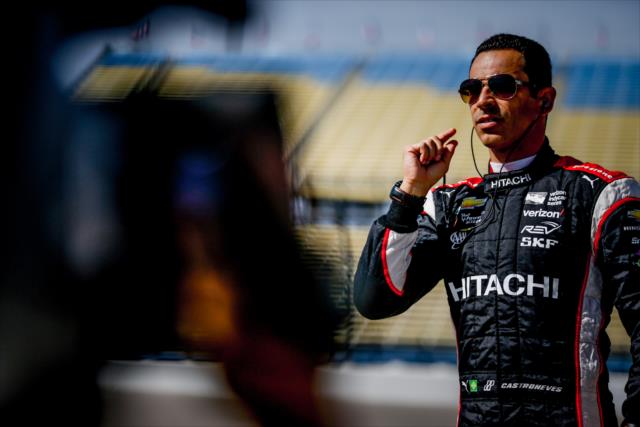 Helio Castroneves walks pit lane prior to practice for the Iowa Corn 300 at Iowa Speedway -- Photo by: Shawn Gritzmacher