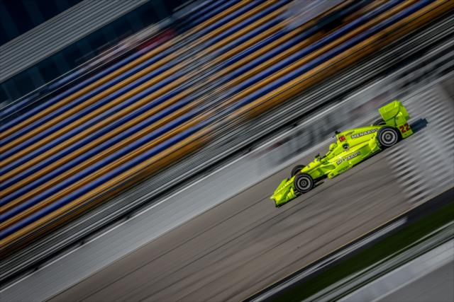 Simon Pagenaud flashes across the start/finish line during practice for the Iowa Corn 300 at Iowa Speedway -- Photo by: Shawn Gritzmacher
