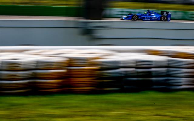 Tony Kanaan rolls down the backstretch during practice for the Iowa Corn 300 at Iowa Speedway -- Photo by: Shawn Gritzmacher