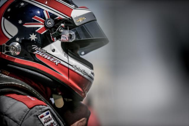 Will Power straps on his helmet prior to practice for the Iowa Corn 300 at Iowa Speedway -- Photo by: Shawn Gritzmacher