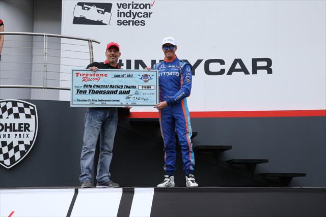 Scott Dixon accepts the Firestone Pit Stop Performance award on behalf of Chip Ganassi Racing for their performance at Texas Motor Speedway -- Photo by: Chris Jones