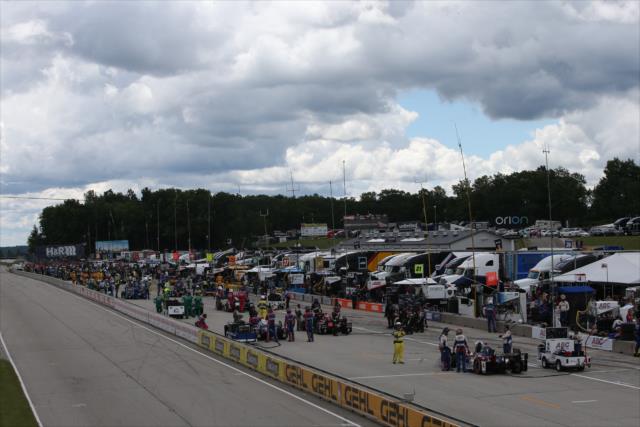 Pit lane comes to life during pre-race festivities for the KOHLER Grand Prix at Road America -- Photo by: Chris Jones