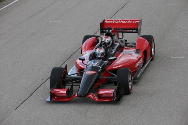 Mario Andretti pilots the two-seater during the parade laps prior to the start of the KOHLER Grand Prix at Road America -- Photo by: Chris Jones