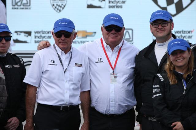 Mike Hull and Chip Ganassi celebrate with NTT Data representatives in Victory Circle at Road America -- Photo by: Chris Jones