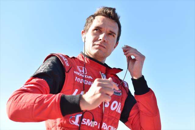 Mikhail Aleshin sets his earpieces prior to the start of the KOHLER Grand Prix at Road America -- Photo by: Chris Owens