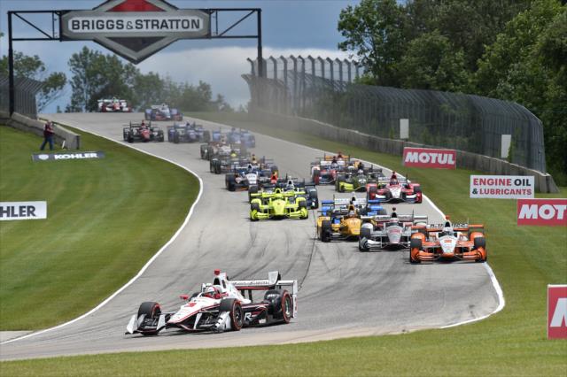Helio Castroneves leads the field down into Turn 3 during the start of the KOHLER Grand Prix at Road America -- Photo by: Chris Owens